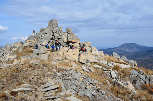 Primorsky krai, Russia, October, 05, 2015. Tourists on the top of mountain Pedan