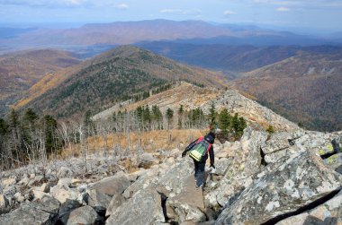 Primorsky krai, October, 05, 2015. tourists descend from the mountain Pedan