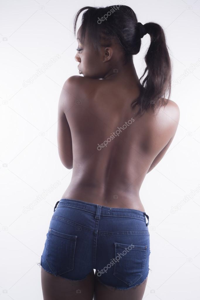 Sexy black woman from back with short jeans