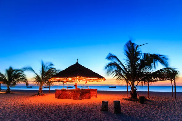 Sunset at a bar in a resort — Stock Photo, Image