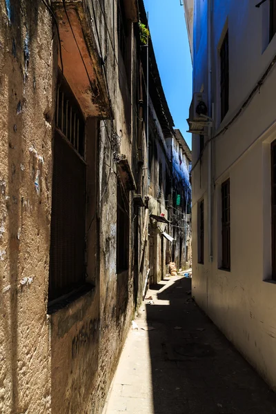 Old dirty buildings in a street in an african city — Stock Photo, Image