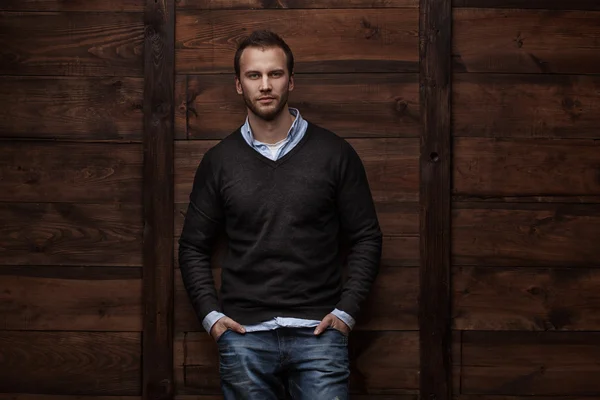 Young handsome man in urban background — Stock Photo, Image