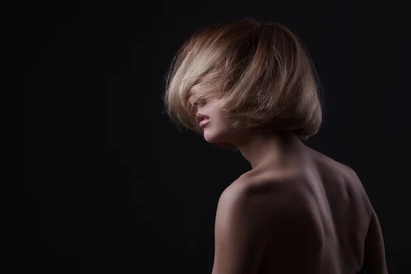 Studio shot of beautiful young blond woman — Stock Photo, Image