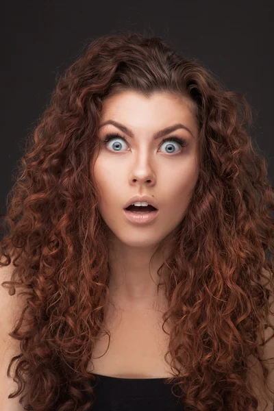 Woman with healthy brown curly hair — Stock Photo, Image
