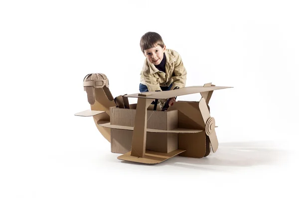 Smiling boy with plane — Stock Photo, Image