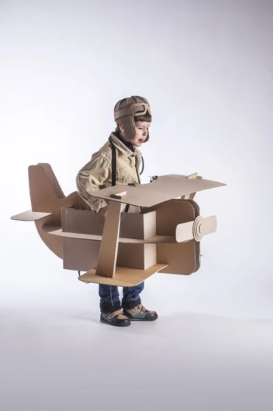 Boy and biplane. — Stock Photo, Image