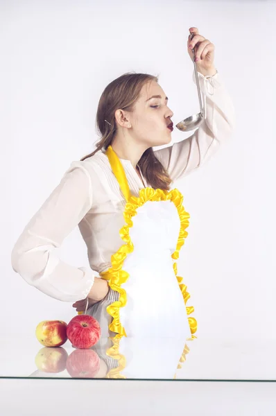 Homemaker tasting food — Stock Photo, Image