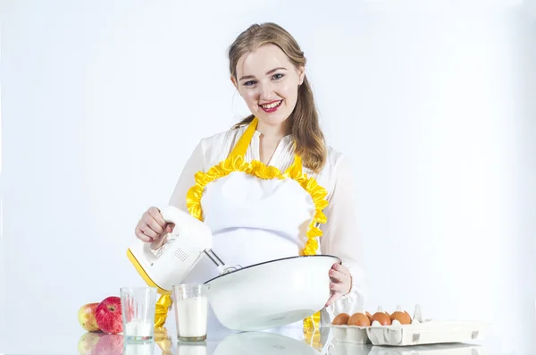 Housewife holding mixer — Stock Photo, Image