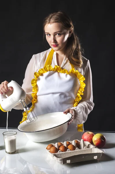 Housewife holding mixer — Stock Photo, Image