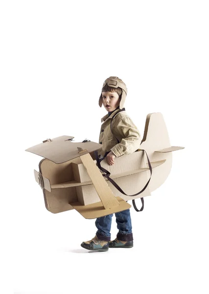 Boy and biplane. Stock Image