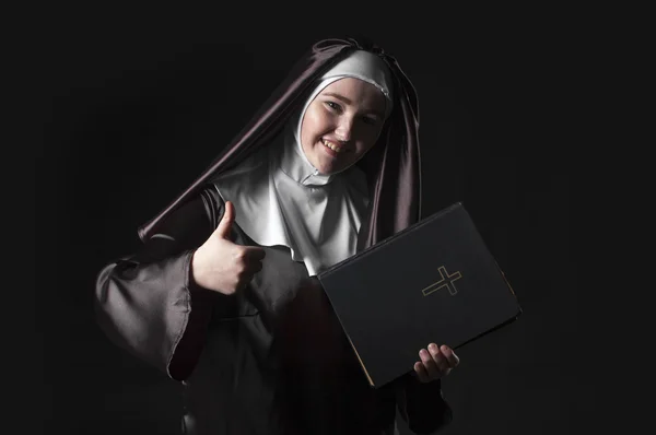 Nun advertises bible — Stock Photo, Image