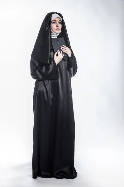 Young nun in religious concept — Stock Photo, Image