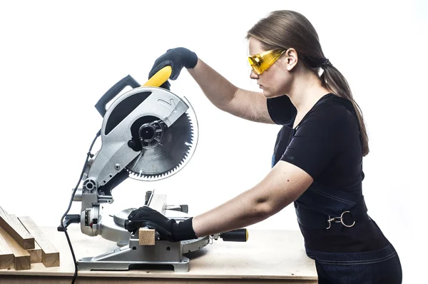 Woman with a circular disk saw — Stock Photo, Image