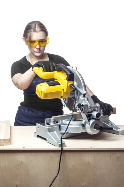 Woman with a circular disk saw — Stock Photo, Image