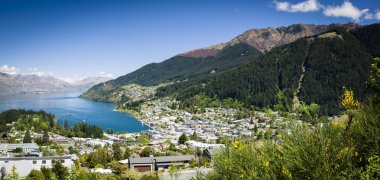 Sunny view of Queenstown on New Zealand's South Island clipart