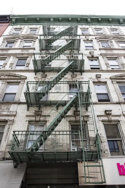 Apartment building with stairs in front in Greenwich Village - Manhattan - New York City - Unites States of America