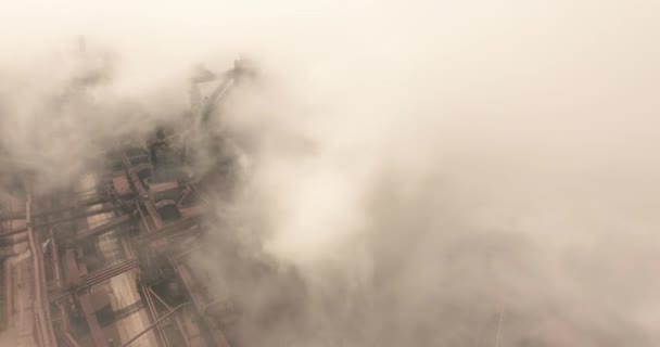 Epic aerial of high pipes with smoke emission. Plant pipes pollute atmosphere. Industrial factory pollution, smokestack exhaust gases. Industry zone, thick smoke plumes. Climate change, ecology. — Stock Video