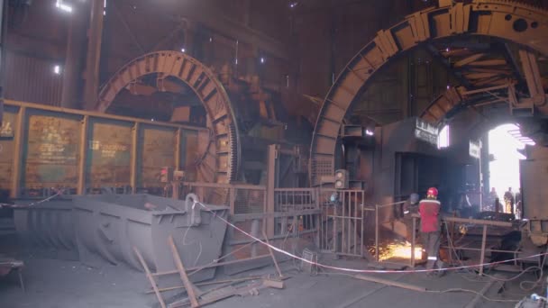 Manufacture Train Wagon Production, Factory Workers are Welding in Protective Helmets and Glasses, Beautiful Epic Shot, Slow Motion. — Stock Video