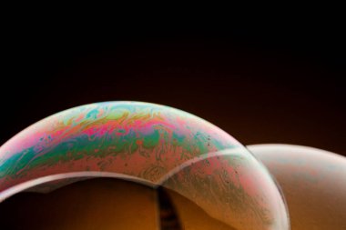 Sabun köpüğünün yarısı, soyut bir yarım daire arka plan. Evrenin ya da gezegenlerin modeli..