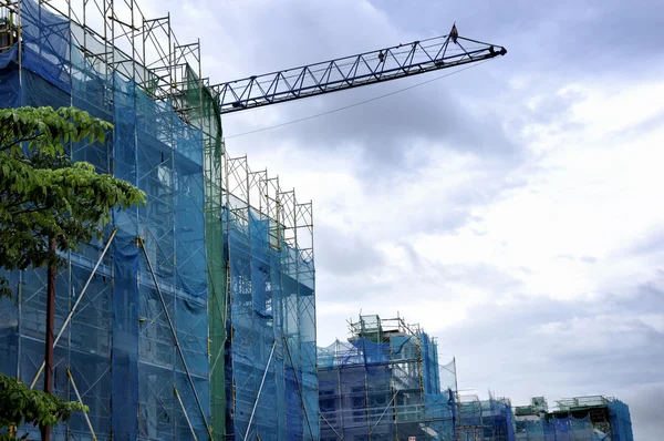 Guindaste de construção e construção — Fotografia de Stock