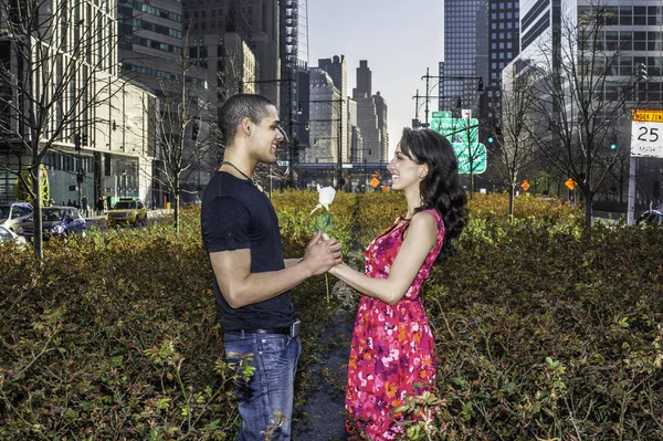 Young Couple Passionately Holding Each Other Hands White Rose Standing — Stok fotoğraf