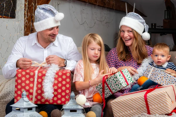 Happy Family Sitting Couch Living Room Unpacking Christmas Presents Concept — Stock Photo, Image