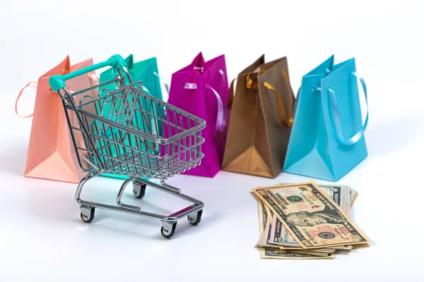 彩色购物袋 购物车和美元钞票 背景为白色 — 图库照片