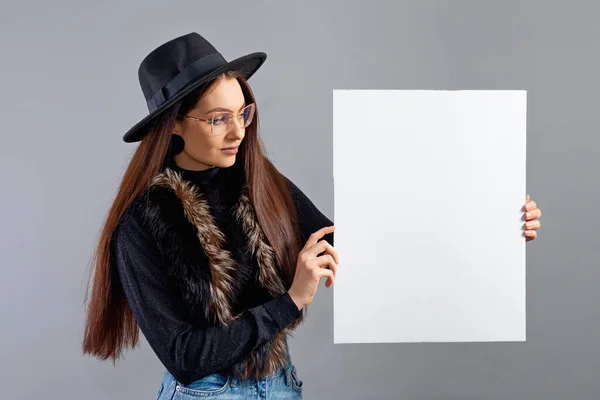 Elegant Young Woman Glasses Hat Showing Blank Board Banner Isolated — Stock Photo, Image