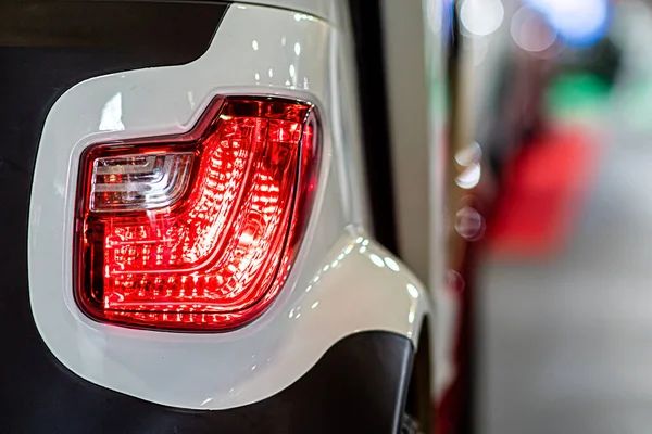 close-up of a red led taillight on a modern car, detail on the rear light of a car