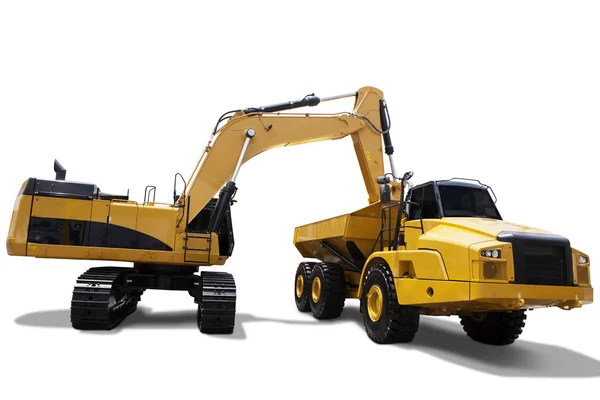 Heavy excavator loads soil on the truck — Stock Photo, Image