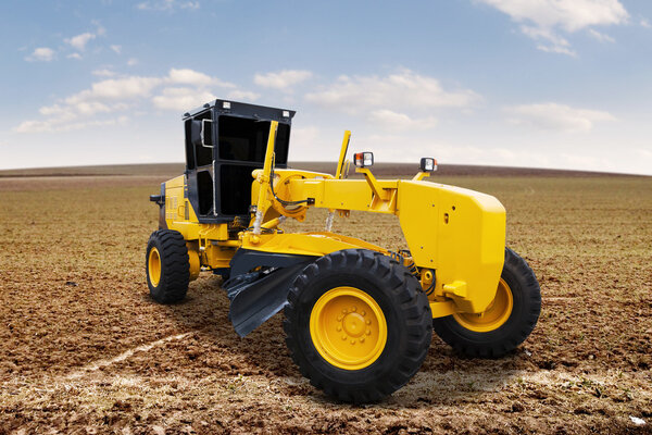 Motor grader on the road construction