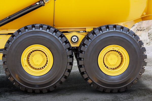 Tires of mining truck on the mining site