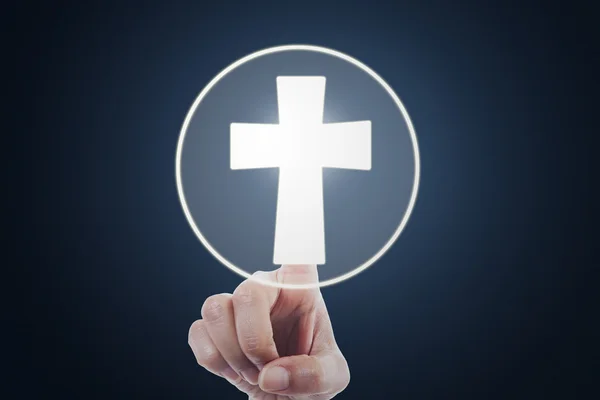 Hand pressing a cross symbol on virtual screen — Stock Photo, Image