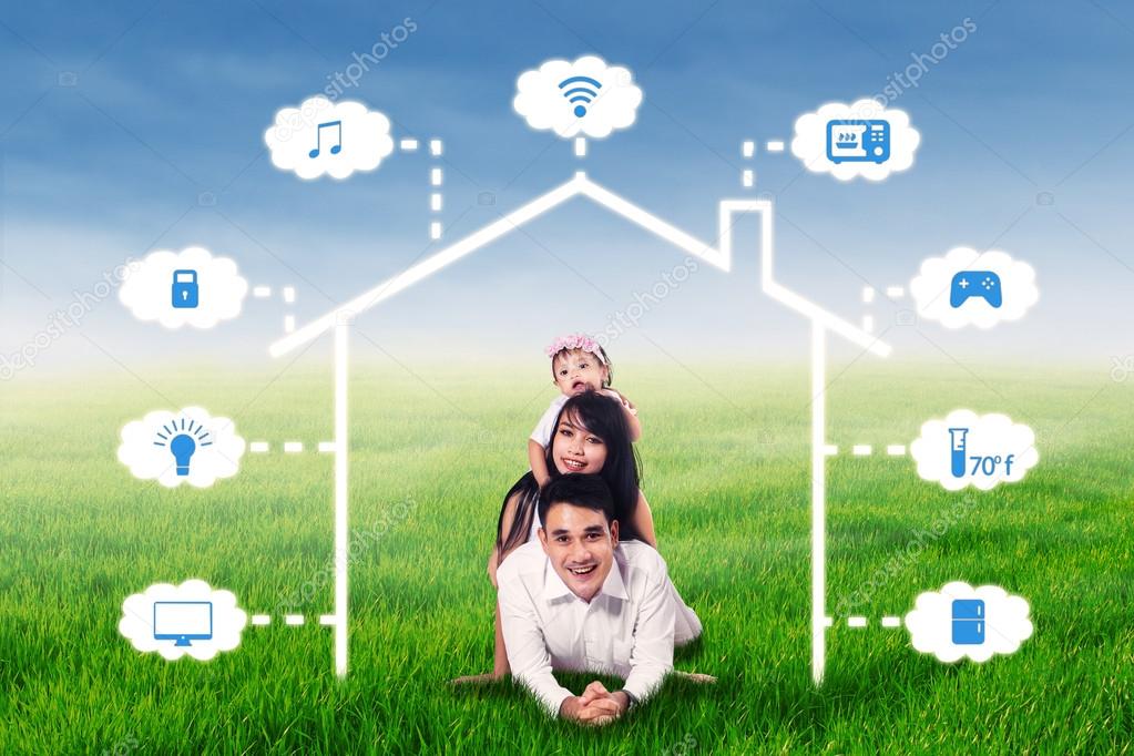 Family lying under smart house network