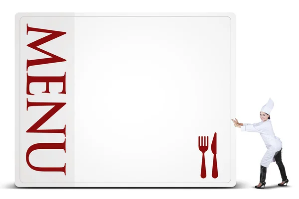 Chef empurra uma placa de menu — Fotografia de Stock