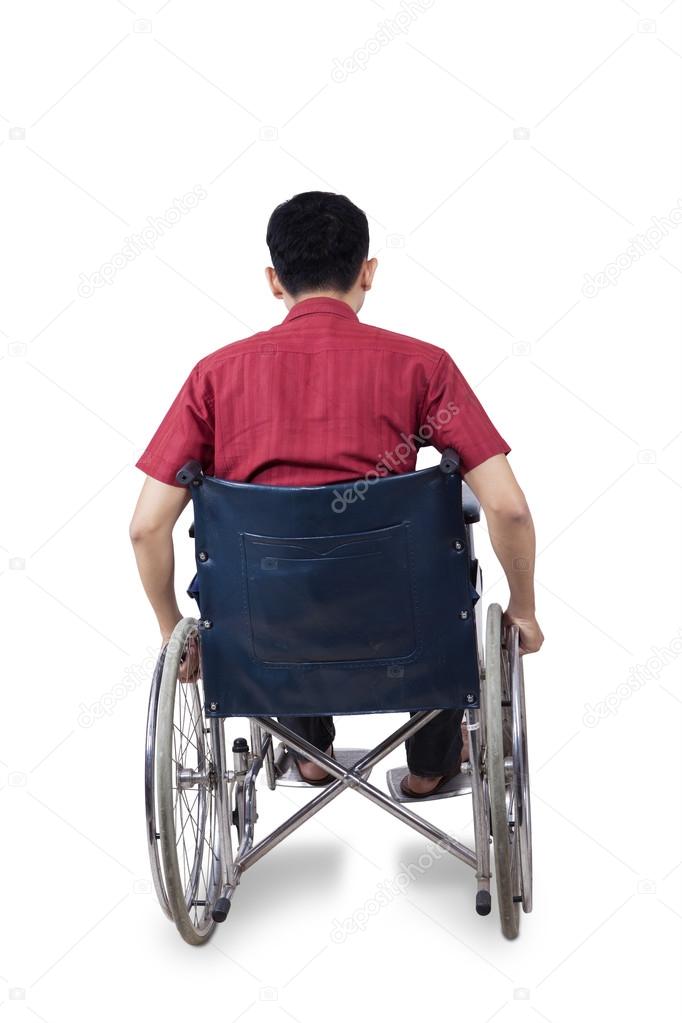 Disabled man sitting on wheelchair
