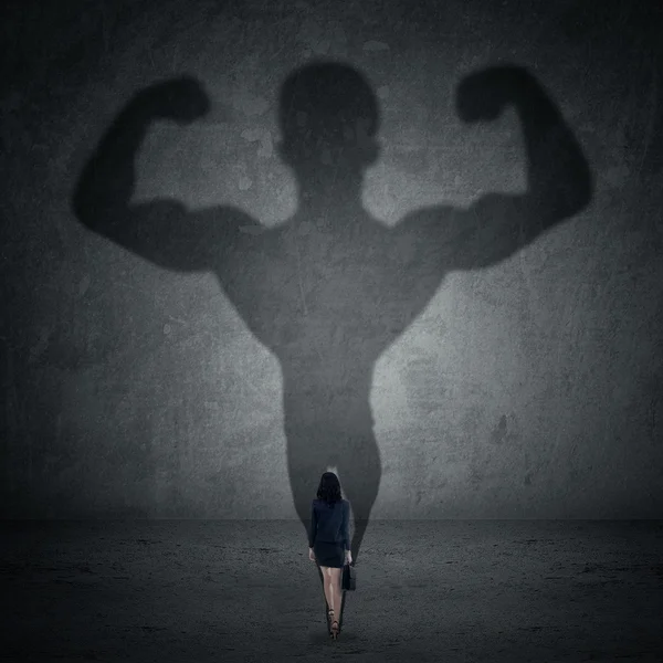 Geschäftsfrau und starker Schatten 2 — Stockfoto