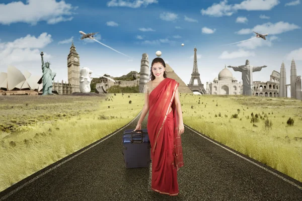 Indian female tourist and the world monuments — Stock Photo, Image