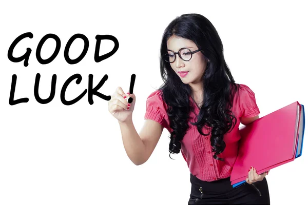 Vrouw schrijft Good Luck — Stockfoto