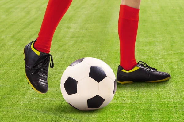 Soccer player dribbles the ball — Stock Photo, Image
