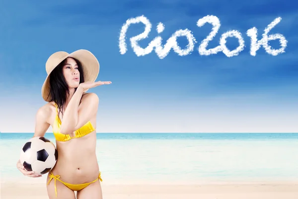 Woman showing text of Rio 2016 — Stock Photo, Image