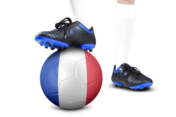 Ноги футболиста с мячом в студии — стоковое фото