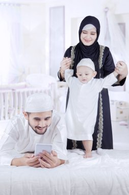 Family watching a video together