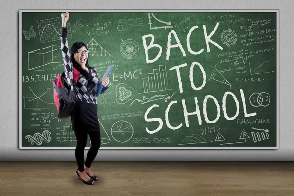 Cheerful student with text Back to School — Stock Photo, Image