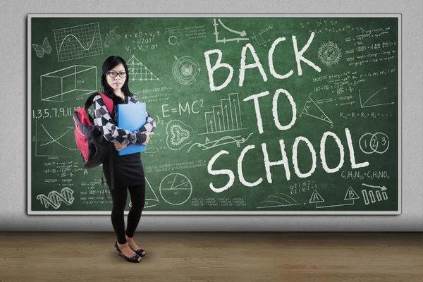 Student with doodles and text of Back to School — Stock Photo, Image