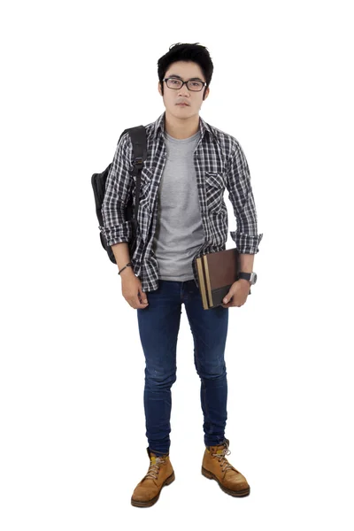 Cool male student standing in studio — Stock Photo, Image