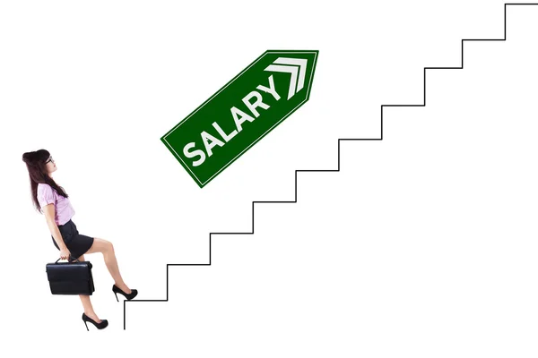 Bastante trabajador con texto de salario en las escaleras —  Fotos de Stock