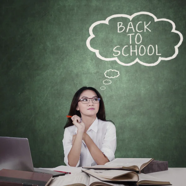 Student imagines text of Back to School — Stock Photo, Image