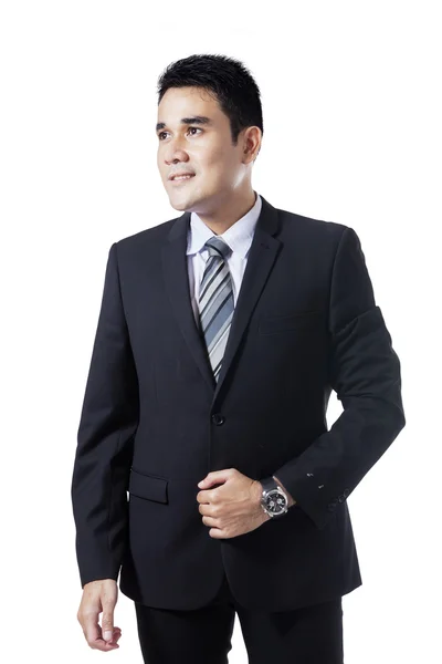 Male entrepreneur standing in studio — Stock Photo, Image