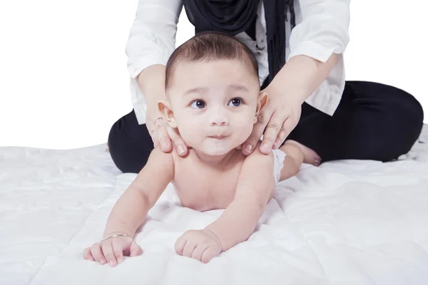 Baby boy massage his back — Stock Photo, Image